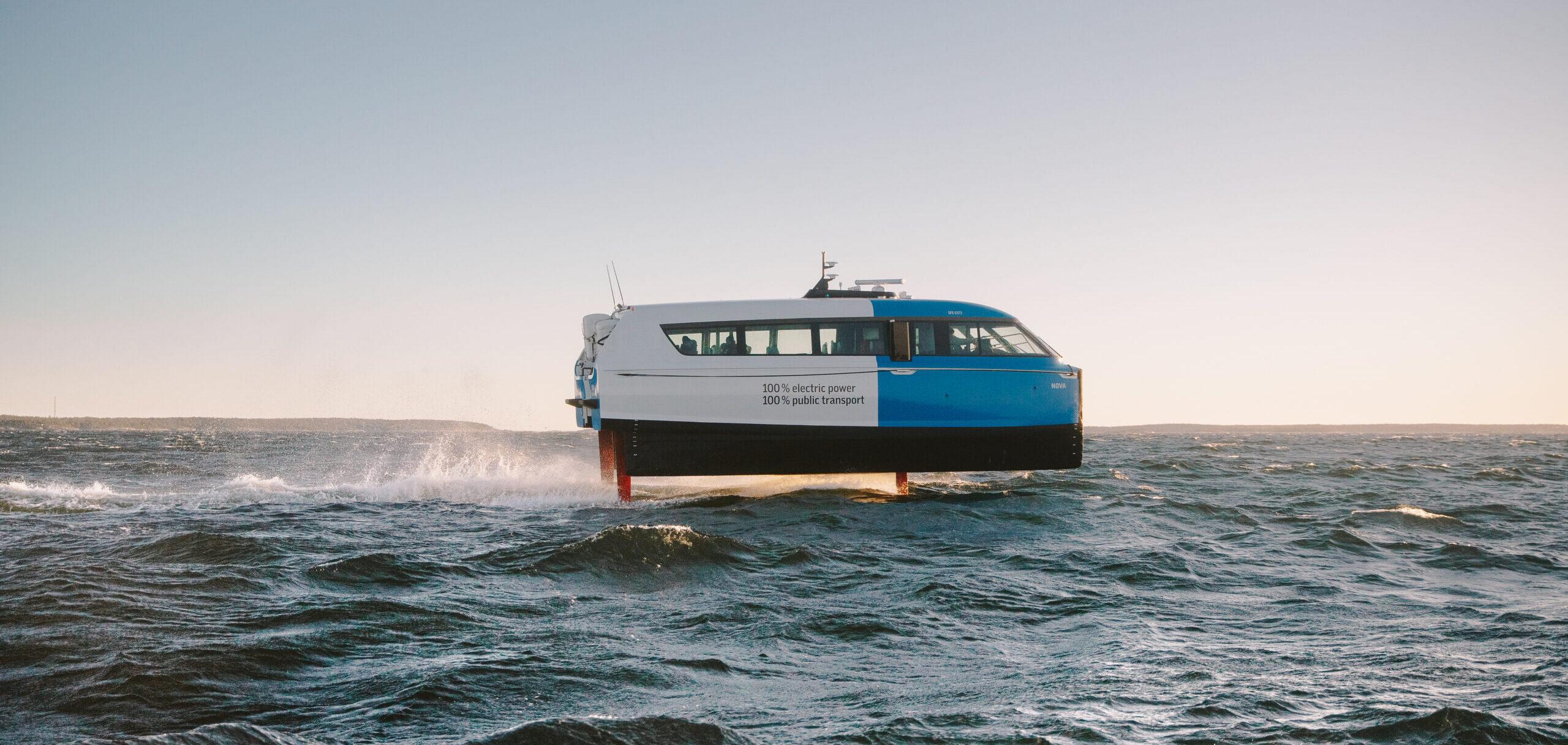 A ferry flying on the water.