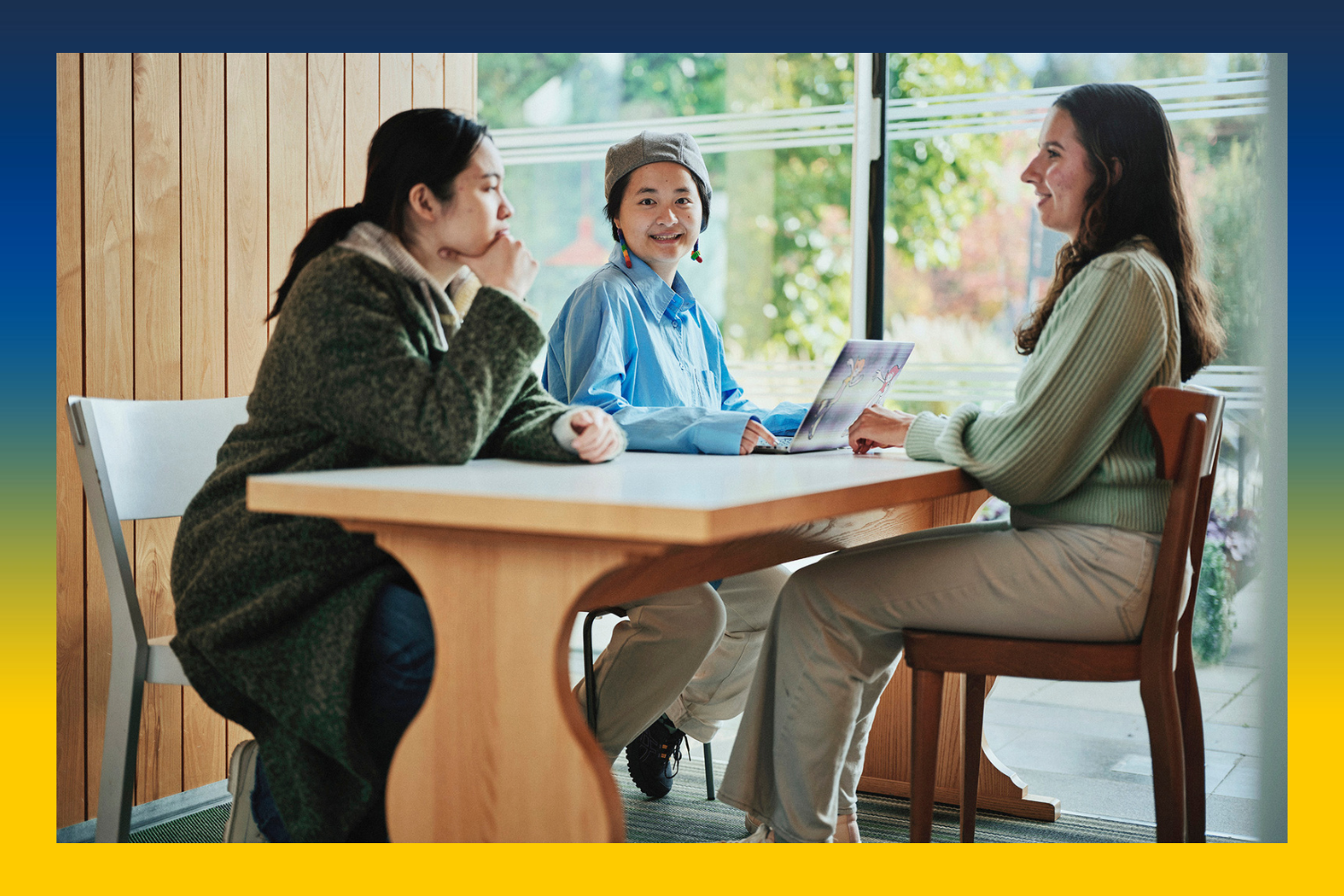 Students working together at a table.